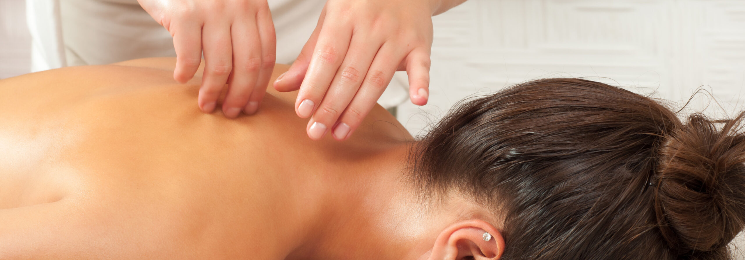 Woman getting massage in health spa